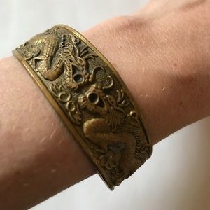 Gold colored adjustable dragon cuff bracelet